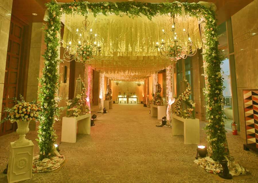 Peach-green decorated pathway created by GTC Events